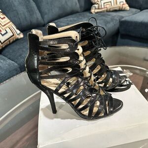 Nine West lace up heals 
Very cute